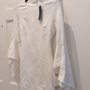 Brand new women’s white mini dress